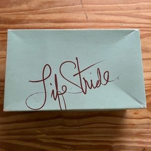 Slightly used blue and white fabric sandal